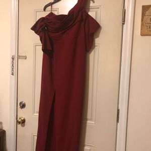 New with tag long evening gown Split in the front